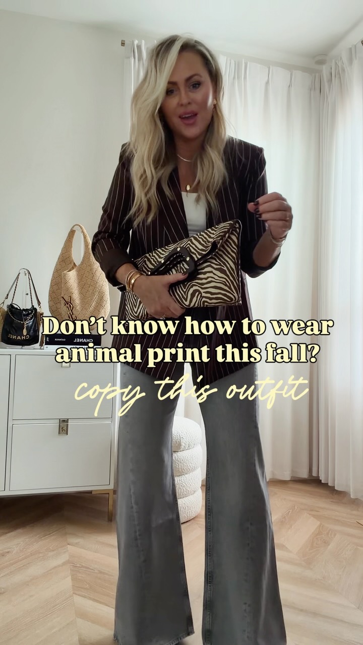 Animal print is basically a neutral this fall🦓🐆 Also THOSE viral jeans just dropped in this NEW wash and they’re even better!🤏🏼 Comment STYLE to shop or head to bio! 

Ladies lunch is always good for the soul🫶🏻! Got so many compliments on this look and you can wear any blazer in your closet🍂💃🏼! 

Fall outfits, blazer, jeans, fall style, fall 2026, workwear, work style, women’s fashion, style over 40, zebra, animal print, accessories, Chicago, weekend, eat, ate, fall look, flare jeans, fall tops, lunch, date night, bag
